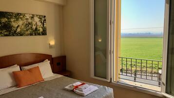 Standard Room, Private Bathroom | Minibar, laptop workspace, blackout curtains, soundproofing