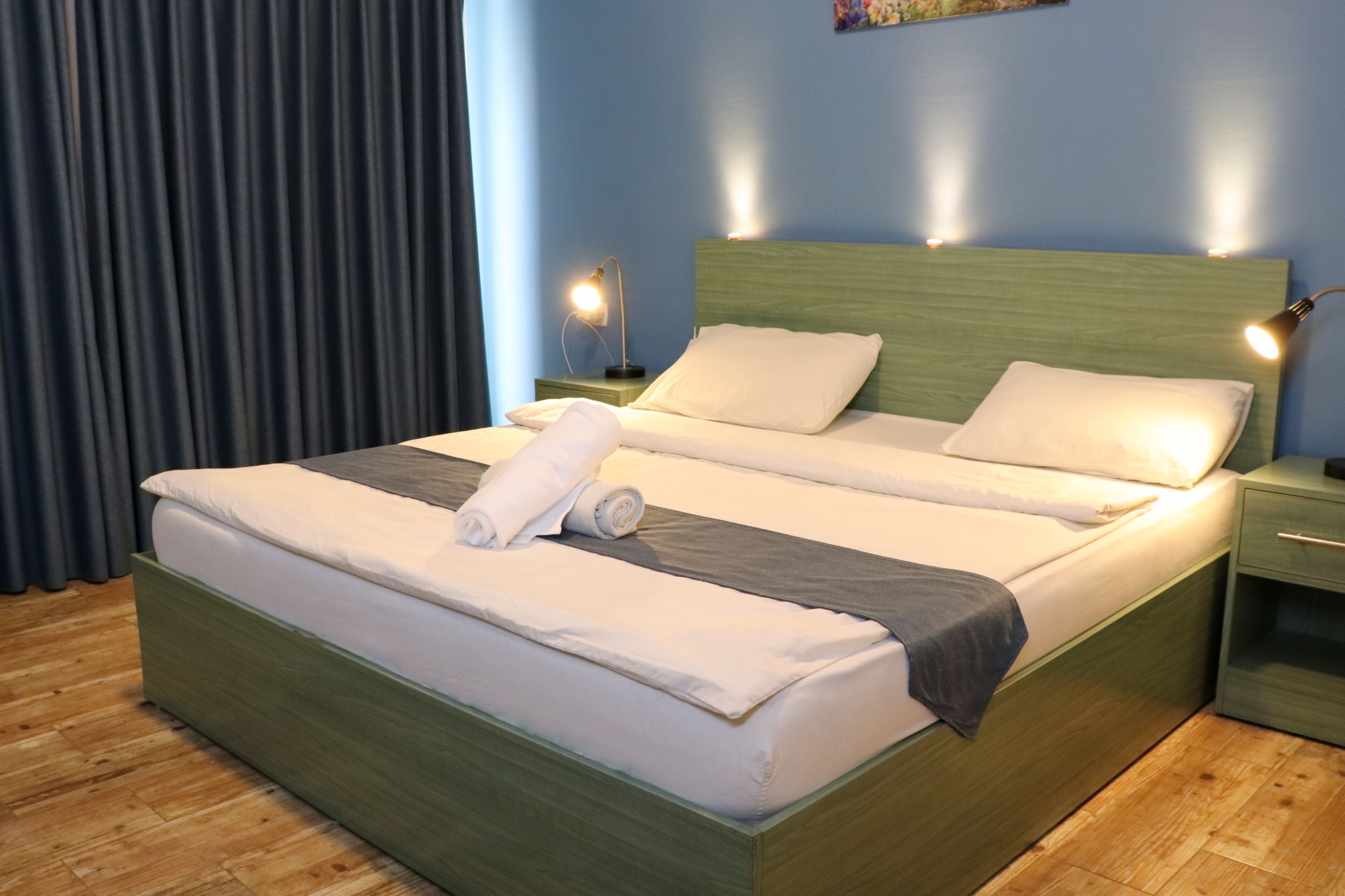 deluxe double room | in-room safe, desk, laptop workspace, iron/ironing board