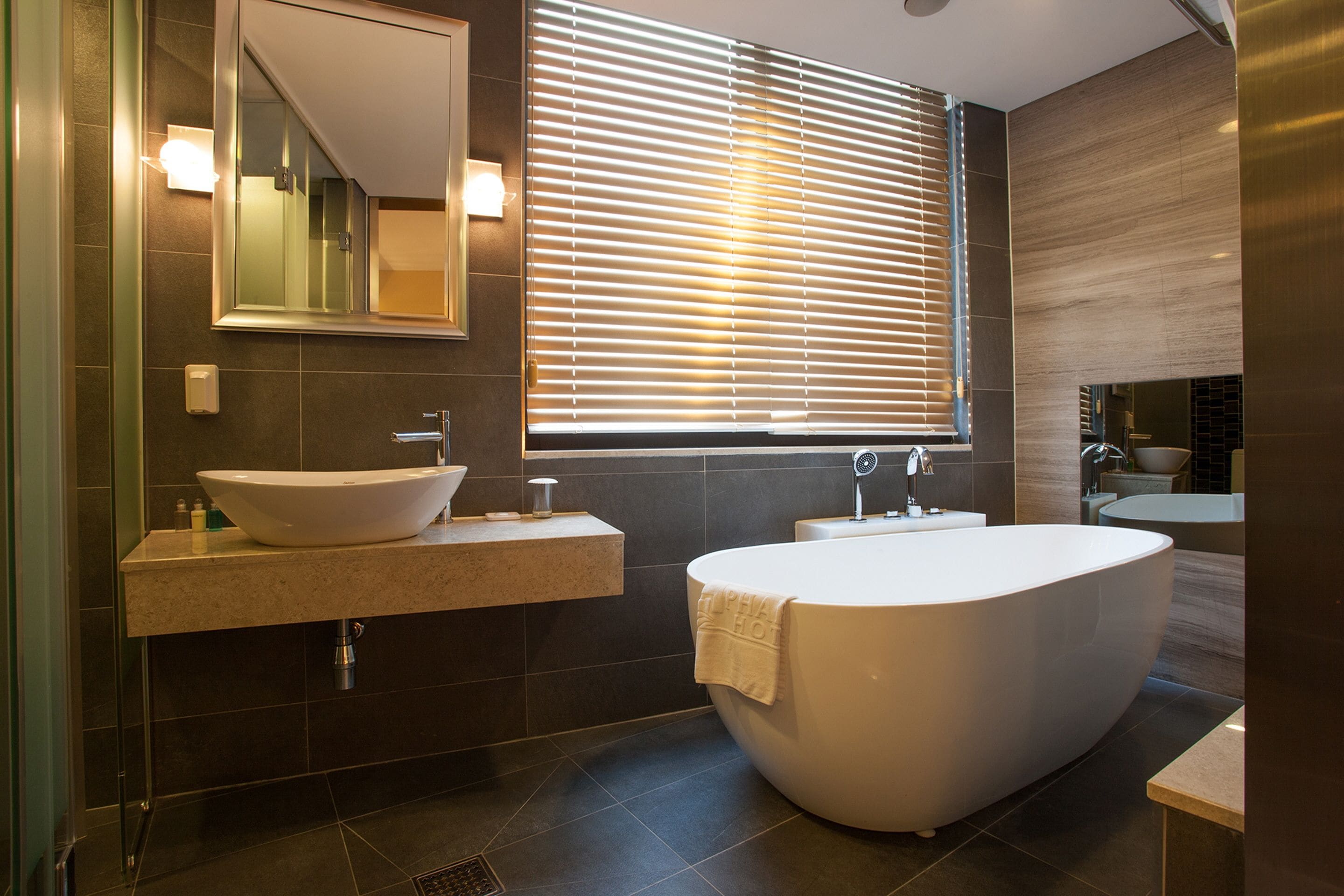 superior double room (bigger than most in seoul) | bathroom | separate bathtub and shower, hair dryer, bathrobes, slippers