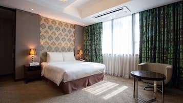 Premium bedding, down duvets, in-room safe, desk