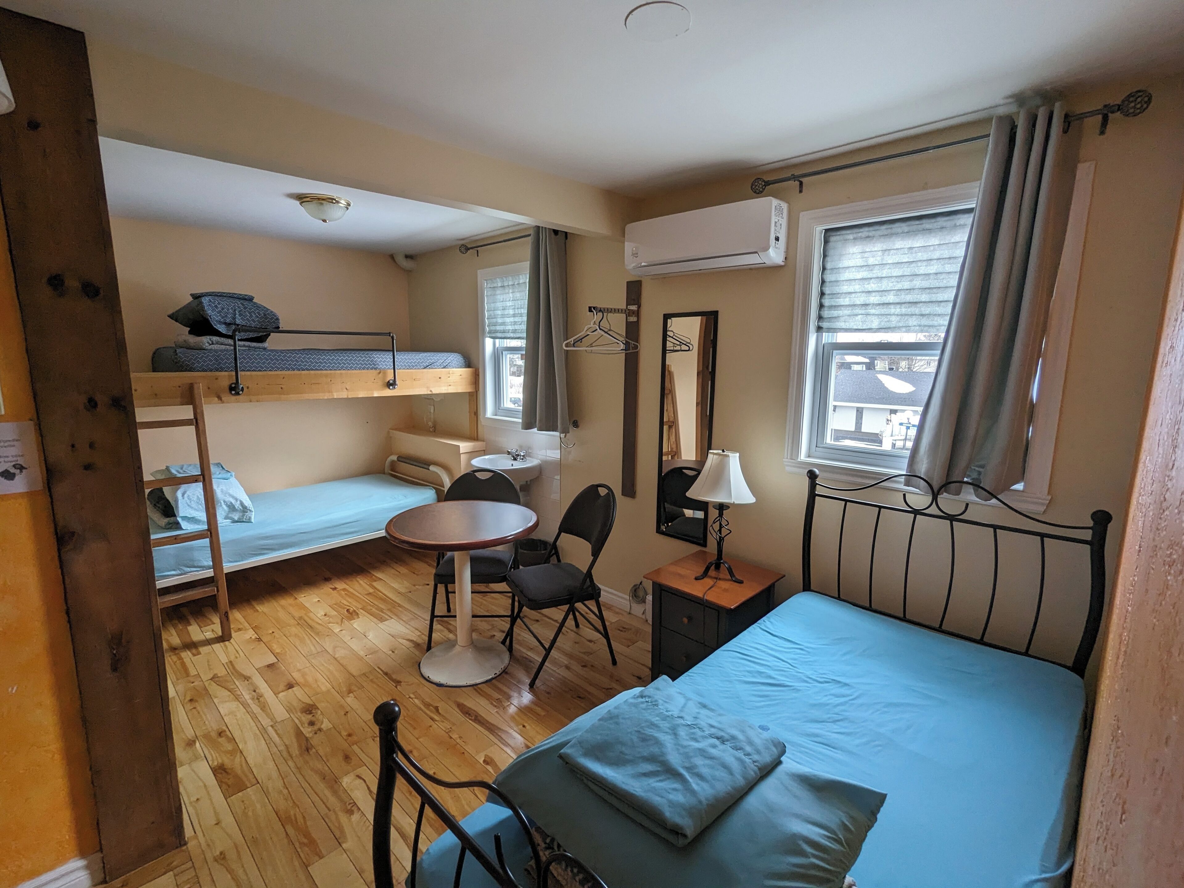 Hypo-allergenic bedding, down duvets, laptop workspace