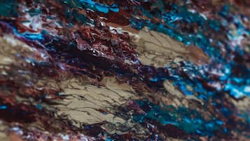 A close-up of a textured surface with a mix of colors.