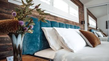Suite ejecutiva | Ropa de cama de alta calidad y cortinas blackout