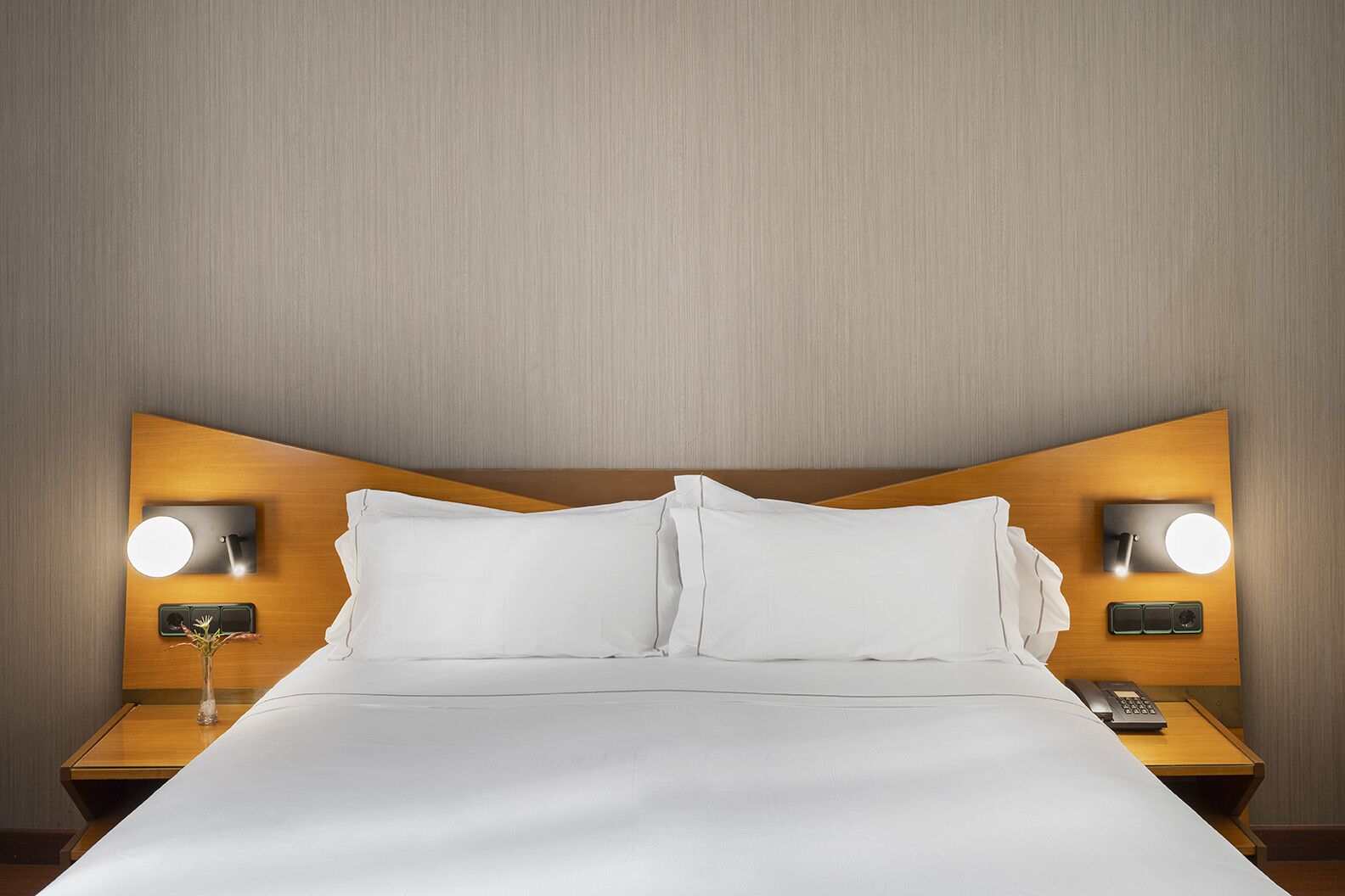 Premium bedding, down comforters, memory foam beds, minibar