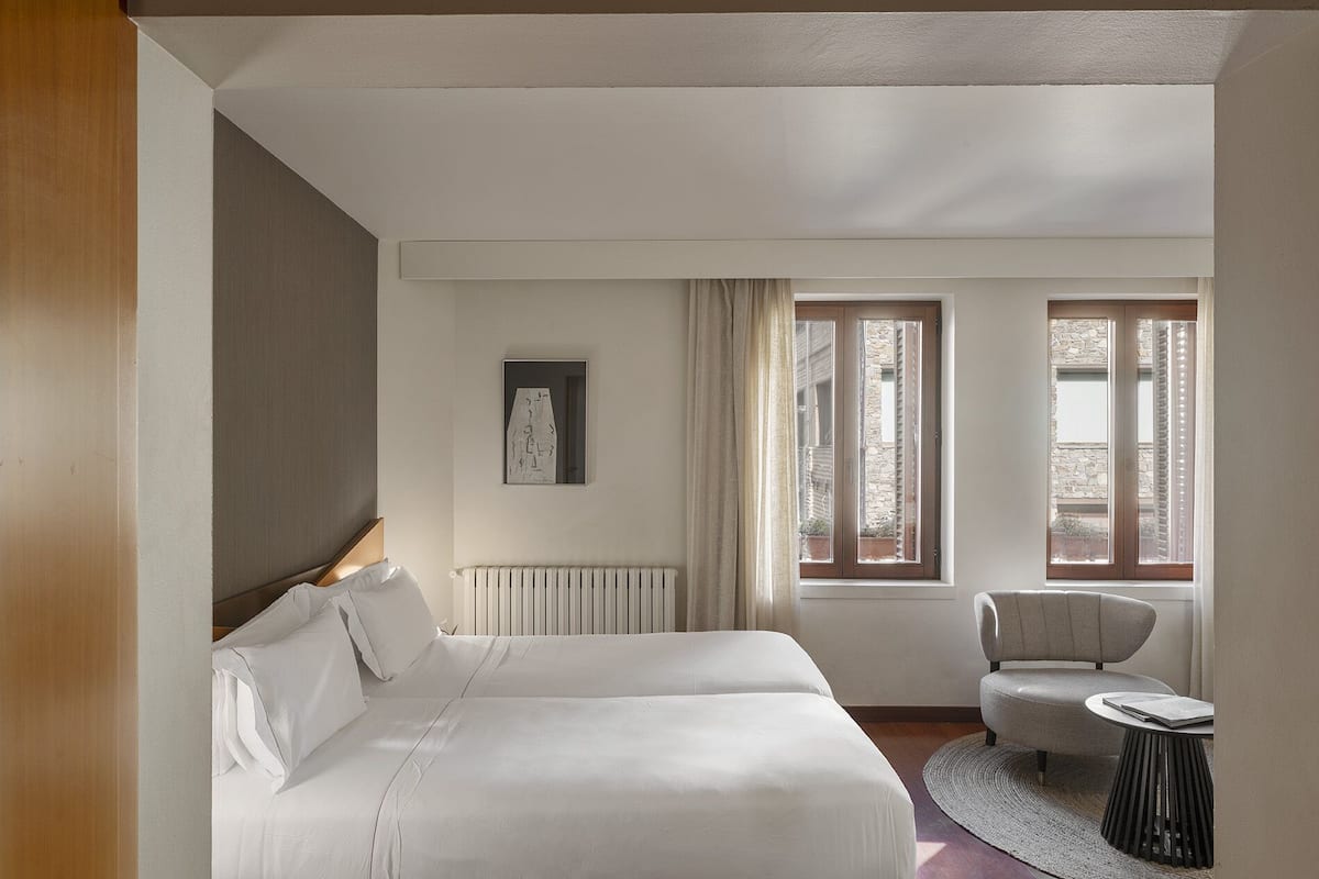 superior double room | premium bedding, down duvets, memory-foam beds, minibar