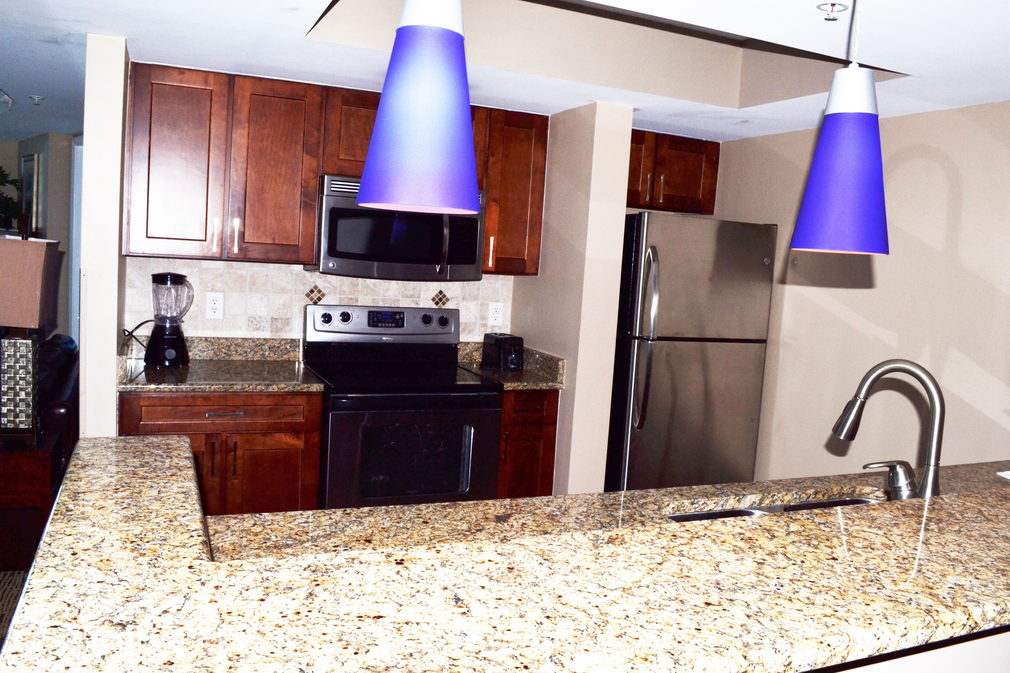 deluxe condo, 3 bedrooms, non smoking, ocean view | private kitchen | full-sized fridge, microwave, oven, stovetop