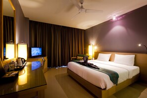 Luxe beddengoed, een kluis op de kamer, een bureau