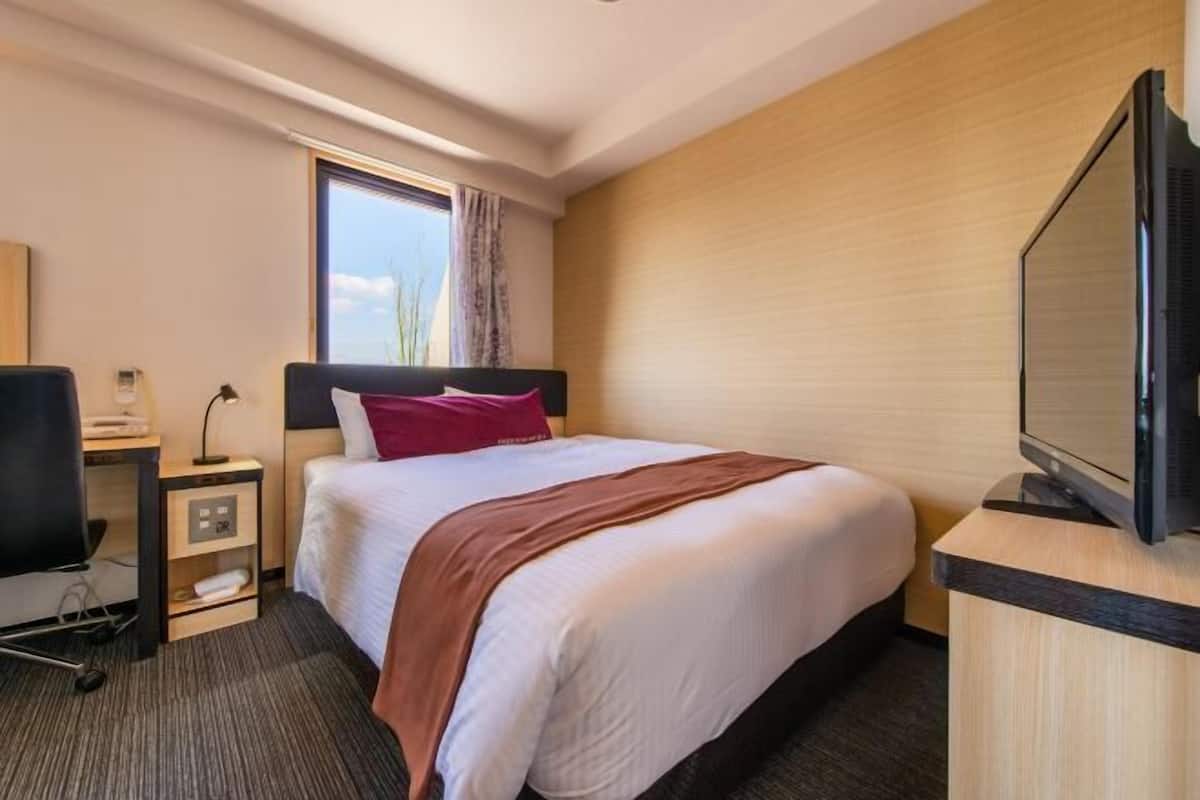 Down comforters, desk, blackout drapes, soundproofing
