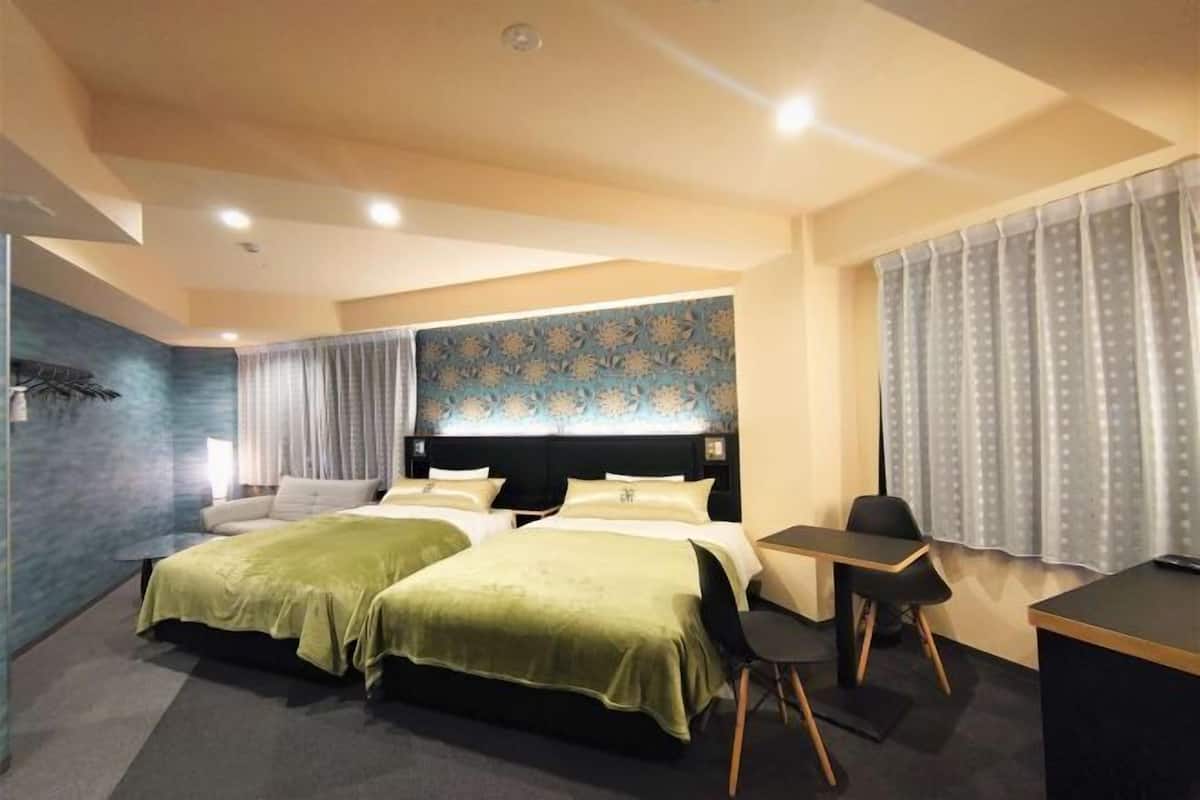 Down comforters, desk, blackout drapes, soundproofing