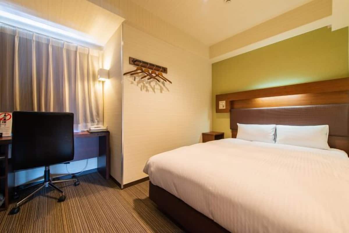 Down comforters, desk, blackout drapes, soundproofing
