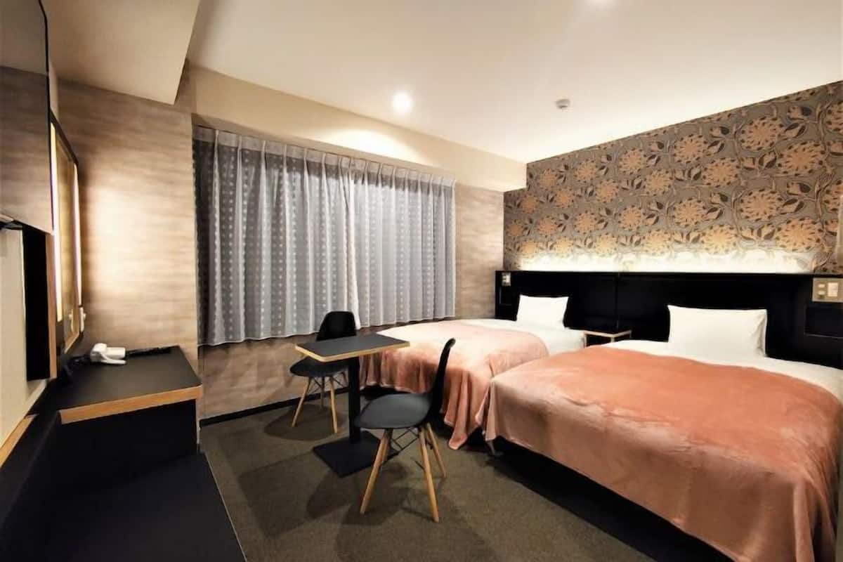 Down comforters, desk, blackout drapes, soundproofing