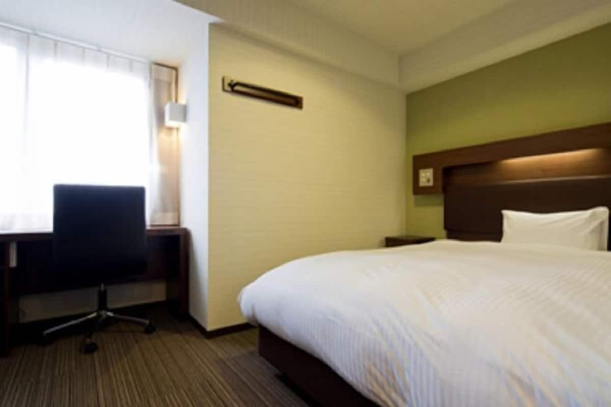 Down comforters, desk, blackout drapes, soundproofing