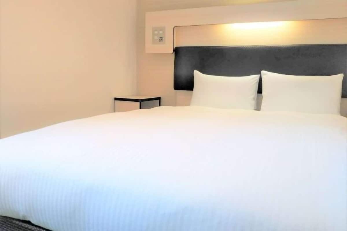 Down comforters, desk, blackout drapes, soundproofing