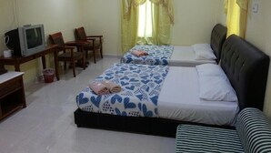 A hotel room with two beds, a desk with a television, and a chair. - MNR Motel (Langkawi)