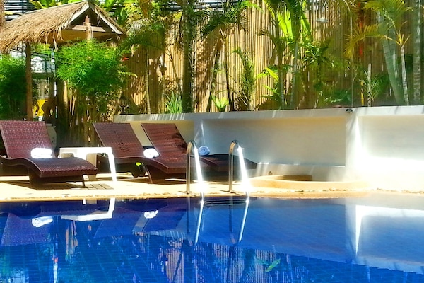 Outdoor pool, sun loungers