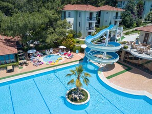 Seasonal outdoor pool, pool umbrellas, pool loungers