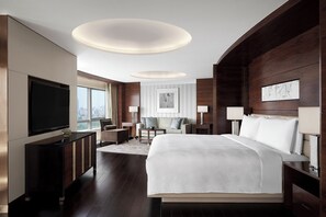 A modern hotel room with a large bed, a flat-screen TV, a desk, and a chair. - JW Marriott Hotel Beijing Central (Beijing)