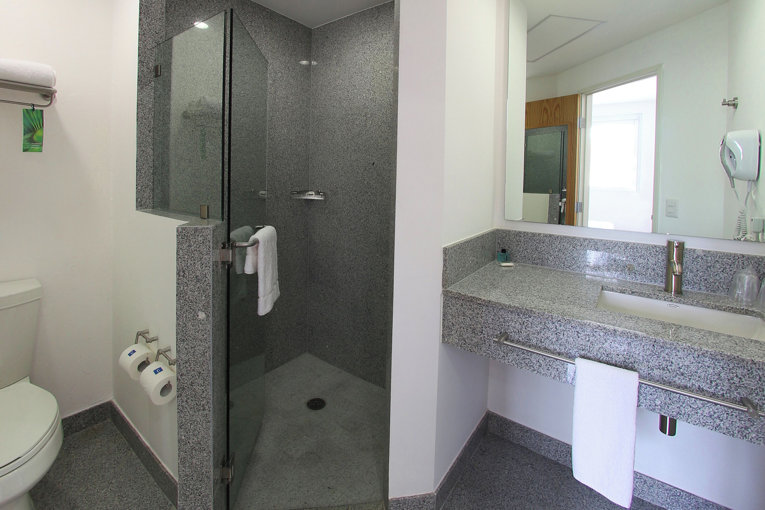 shower, free toiletries, hair dryer, towels