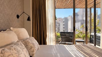 Deluxe Suite, 1 Bedroom, Terrace | Premium bedding, down comforters, pillowtop beds, minibar