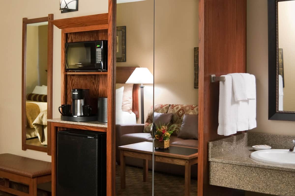 deluxe room, 2 queen beds | in-room safe, individually furnished, desk, blackout curtains