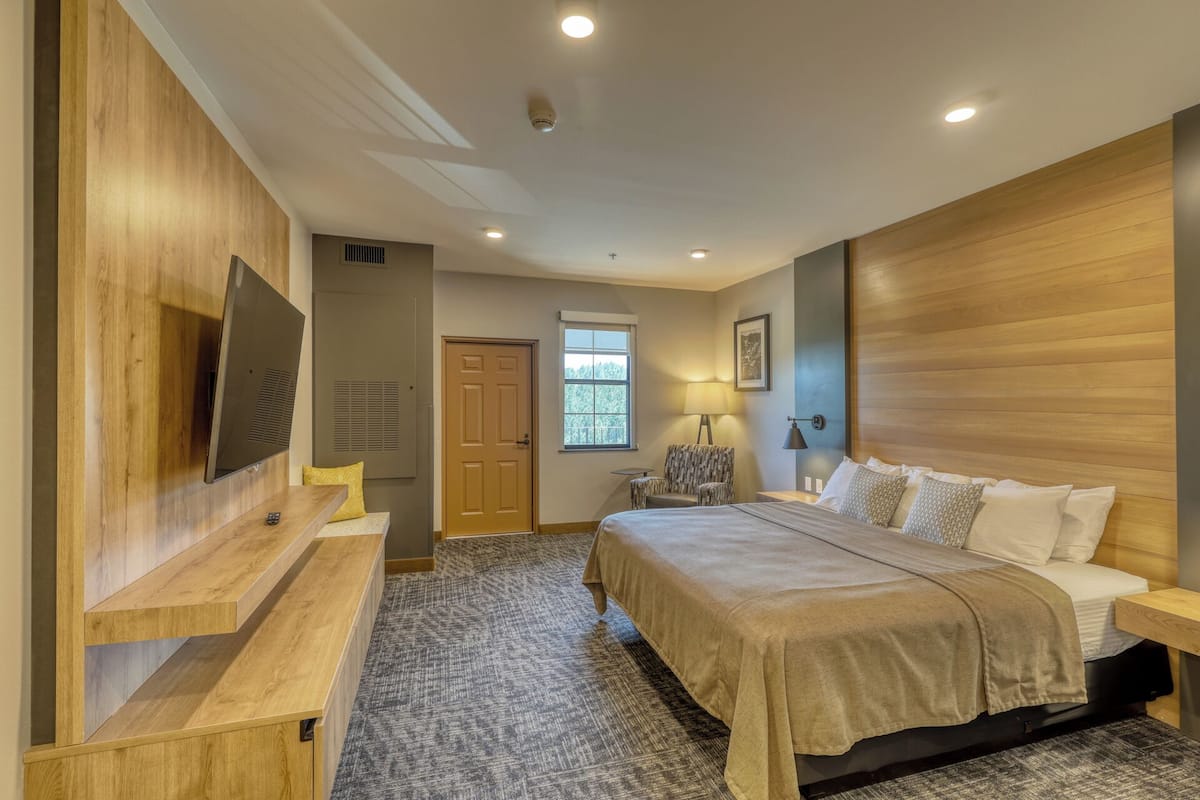Superior Room, 1 King Bed, Balcony | In-room safe, individually furnished, desk, blackout drapes