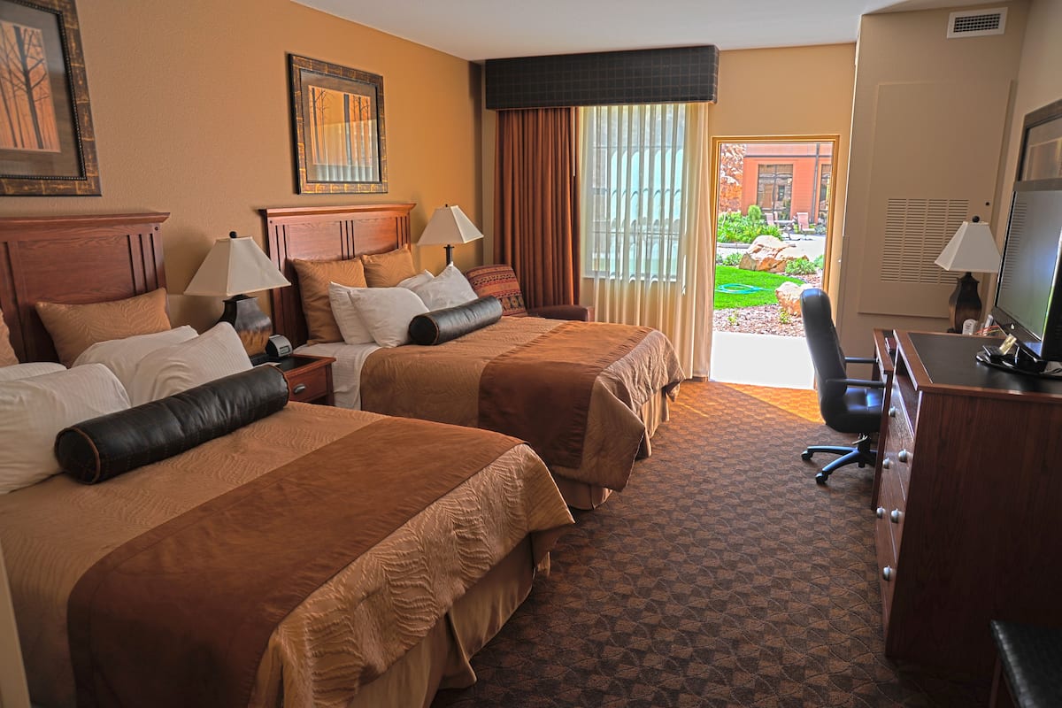 superior room, 2 queen beds | in-room safe, individually furnished, desk, blackout curtains