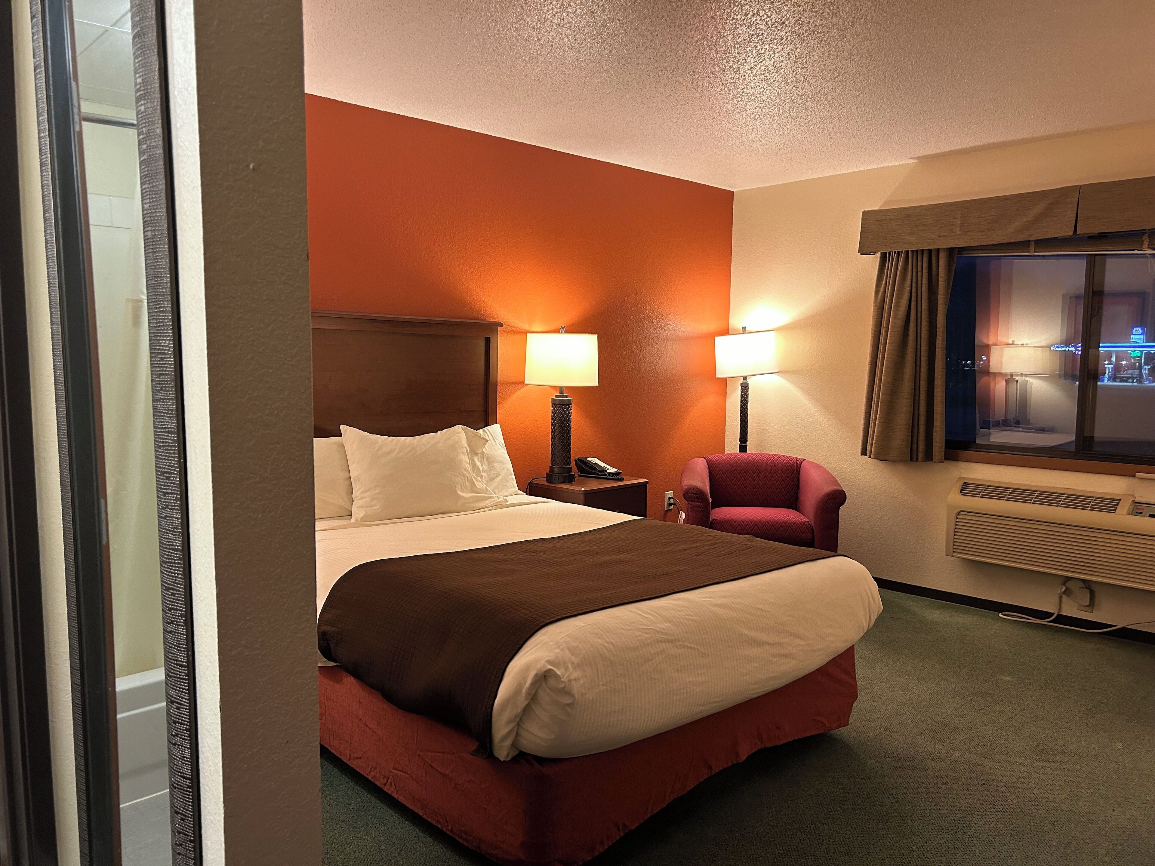 Pillow-top beds, desk, laptop workspace, blackout curtains