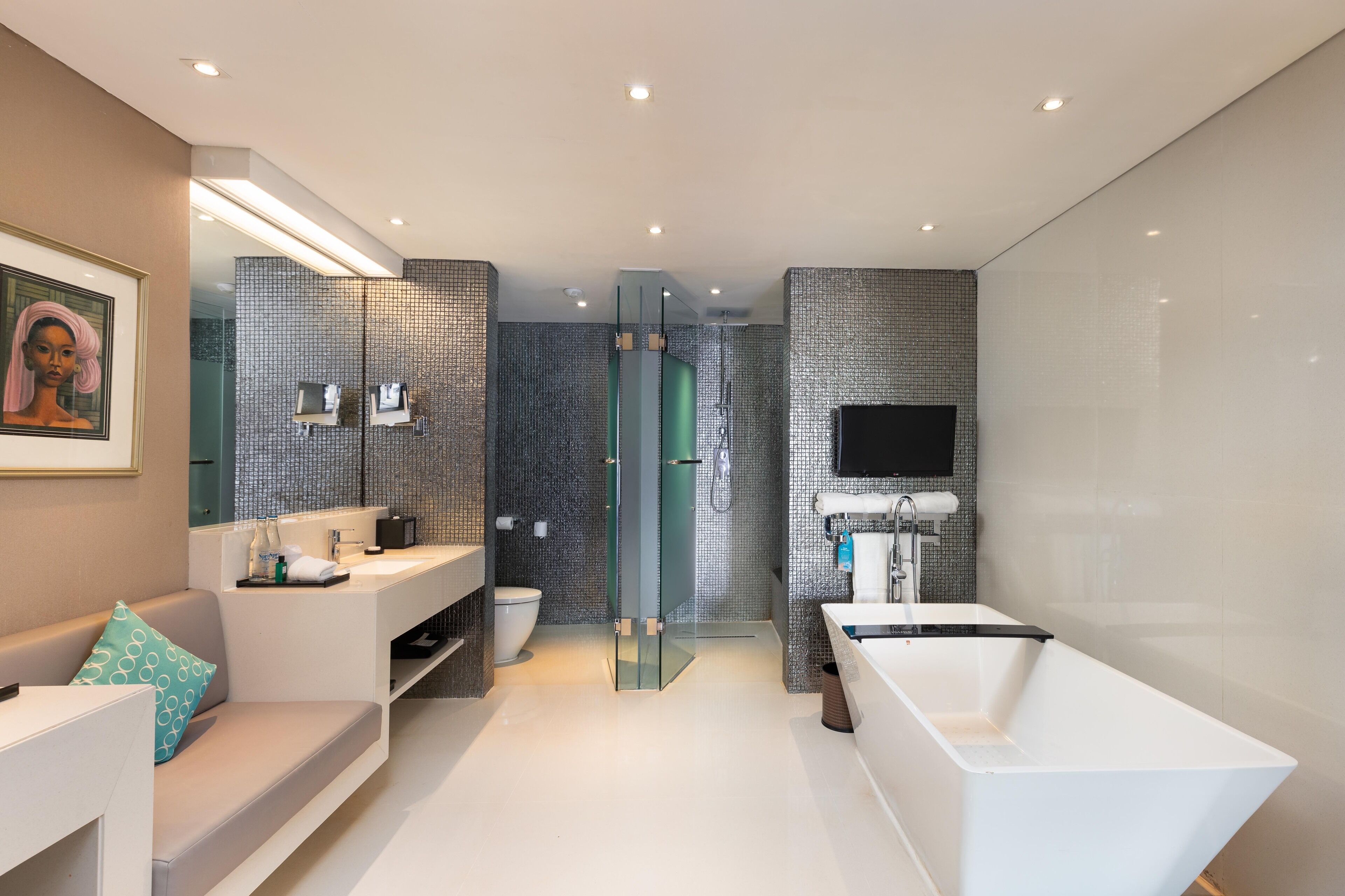 separate bathtub and shower, rainfall showerhead, designer toiletries