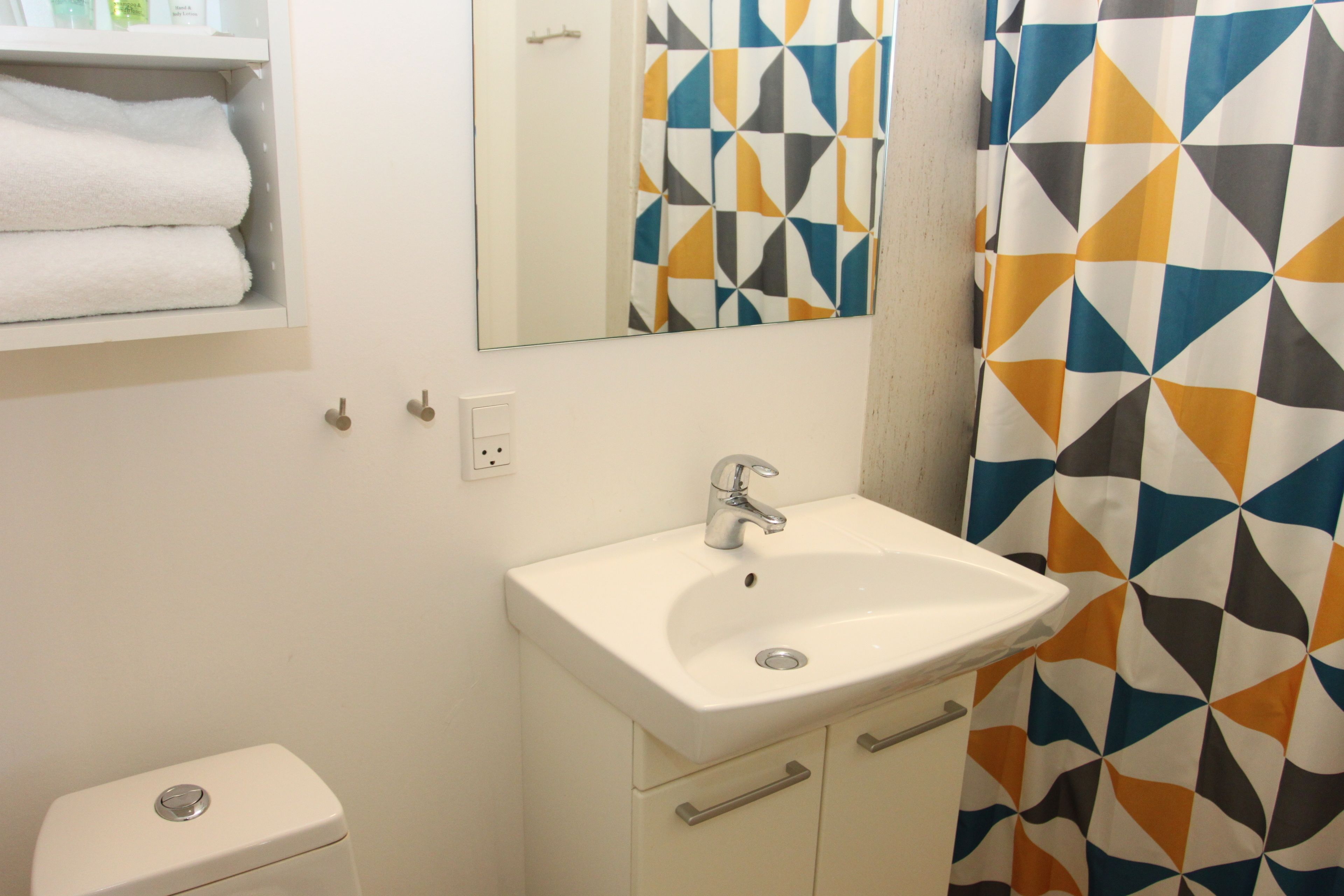 economy double room | bathroom | shower, free toiletries, hair dryer, towels