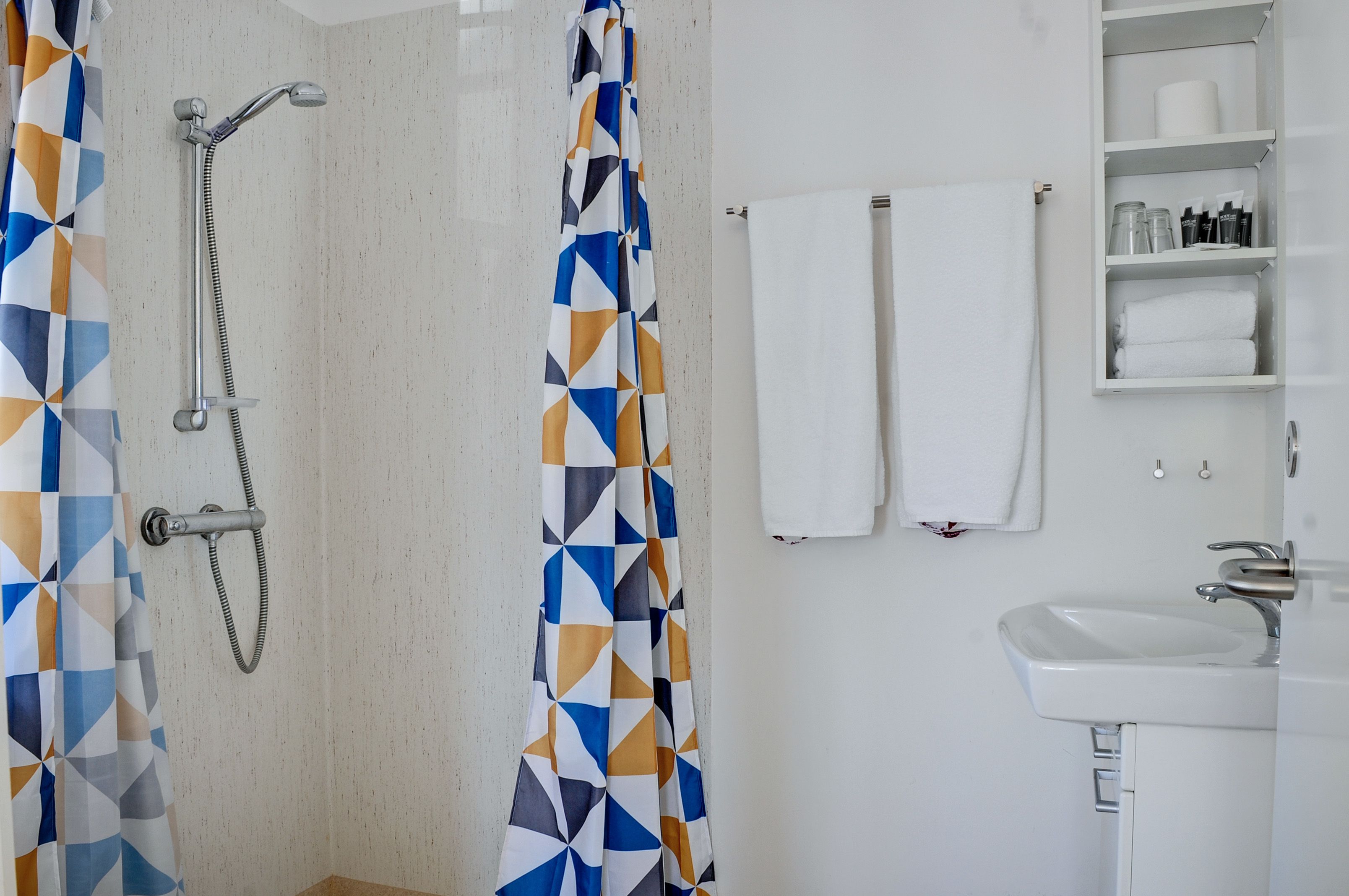 superior double room | bathroom | shower, free toiletries, hair dryer, towels