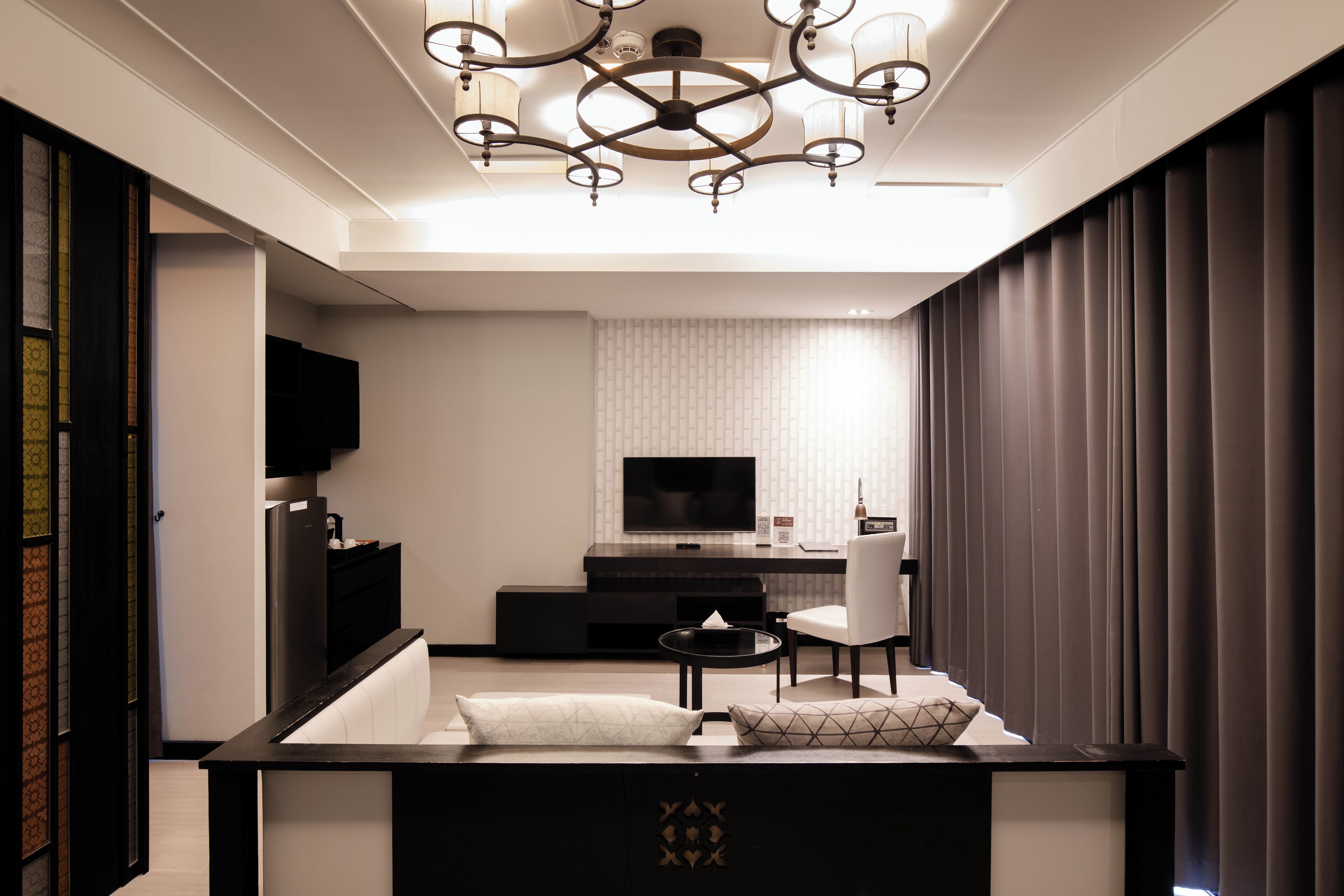 grand deluxe room | living area | 40-inch led tv with cable channels, tv, dvd player