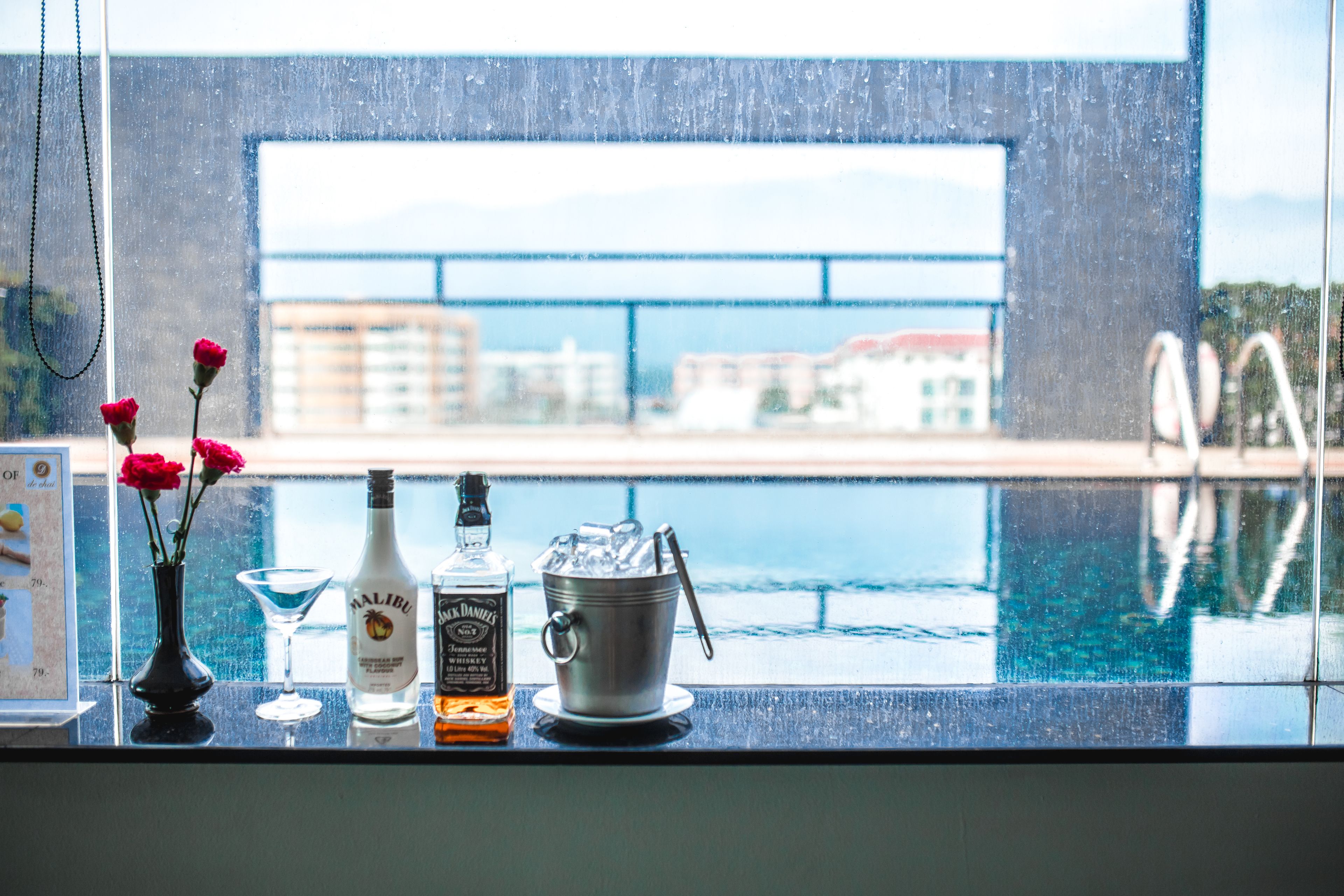 outdoor pool, open 7:00 am to 6:00 pm, pool umbrellas, pool loungers