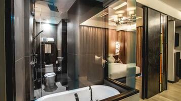 Grand Deluxe Room | Bathroom | Separate bathtub and shower, deep-soaking bathtub, rainfall showerhead