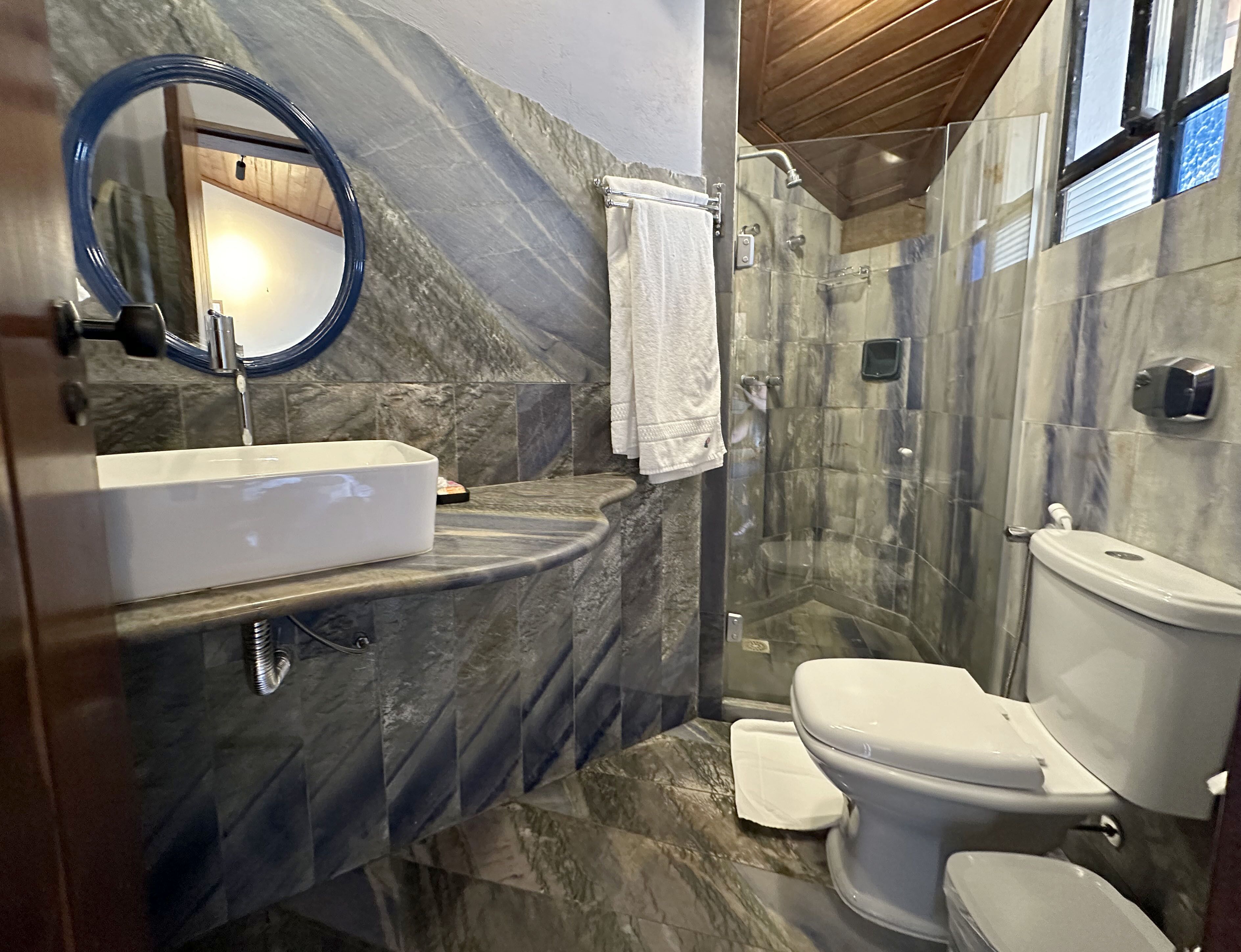 superior room | bathroom | shower, hair dryer, towels