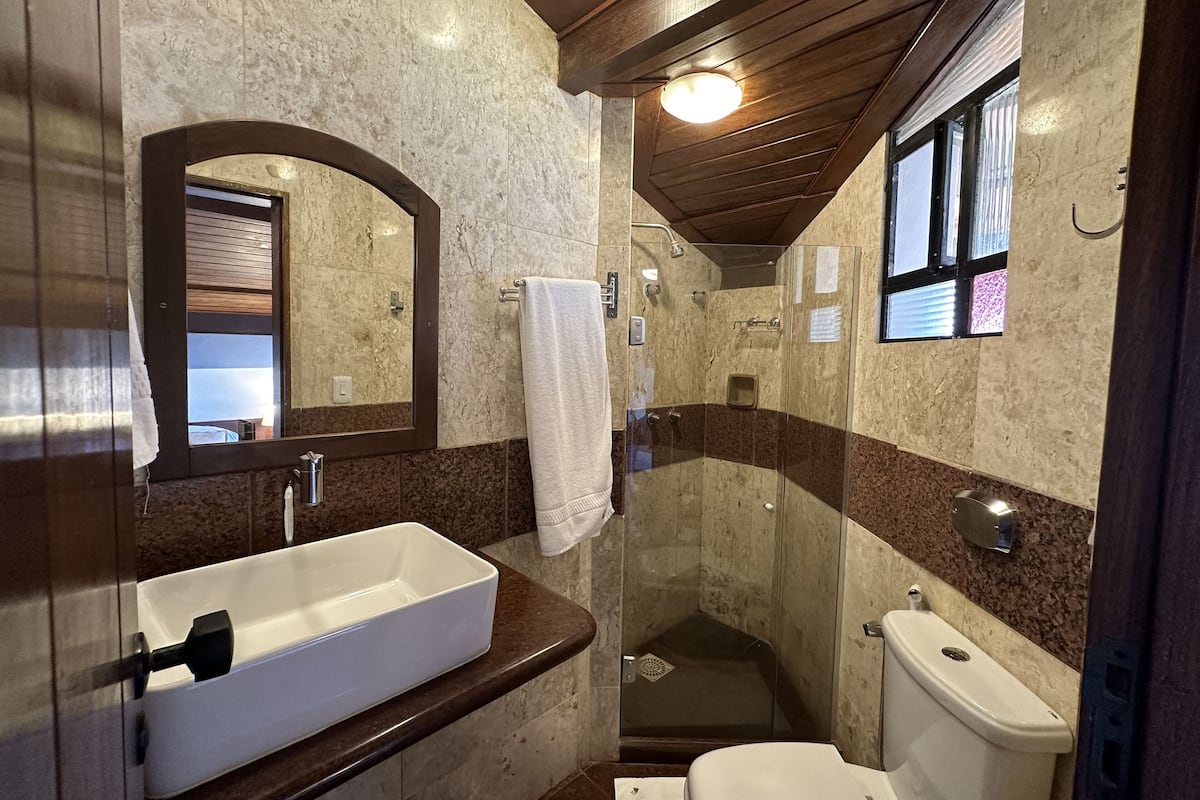 superior room | bathroom | shower, hair dryer, towels