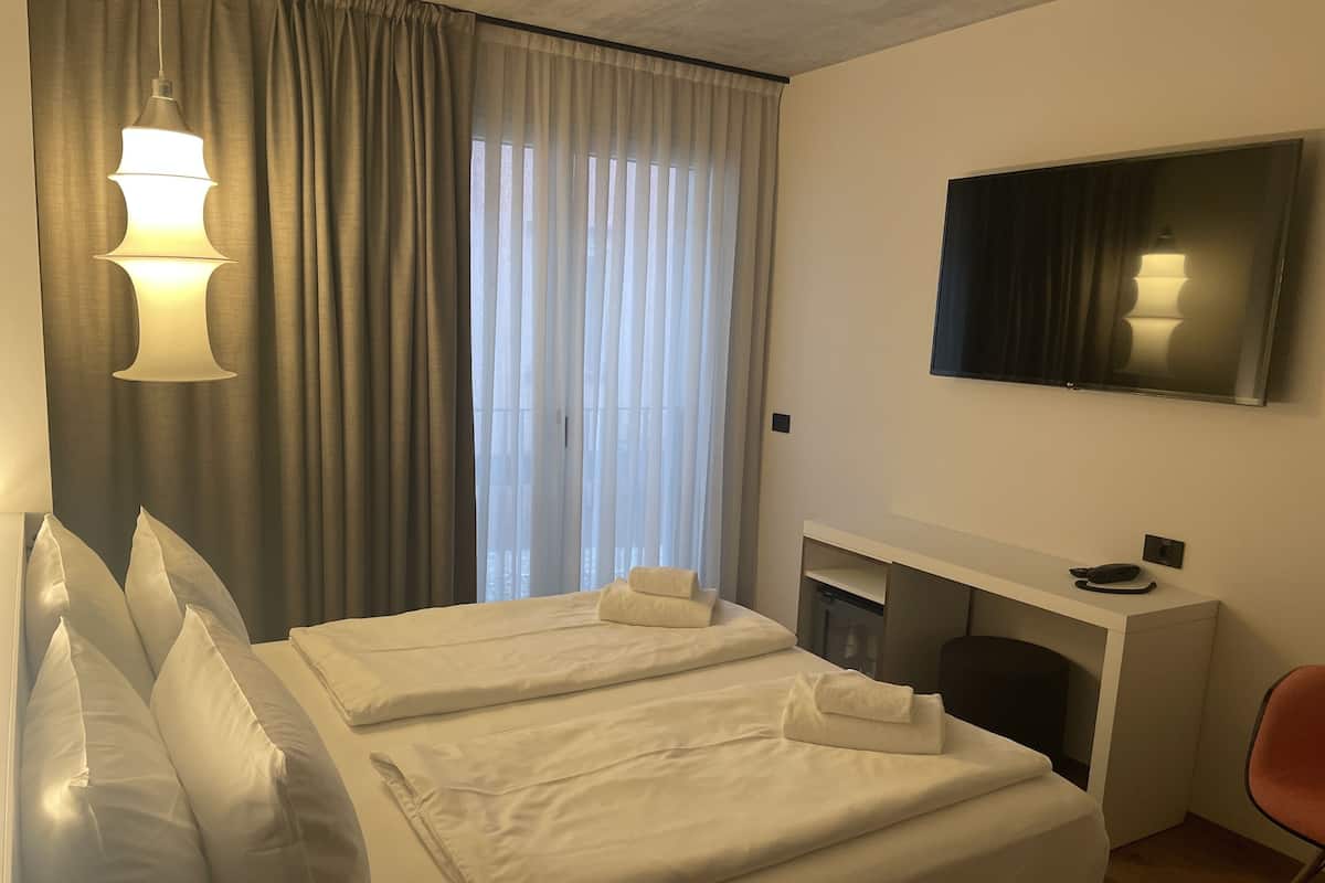 Down duvets, minibar, in-room safe, desk