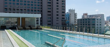 Outdoor pool, open 6:30 AM to 10:00 PM, pool loungers