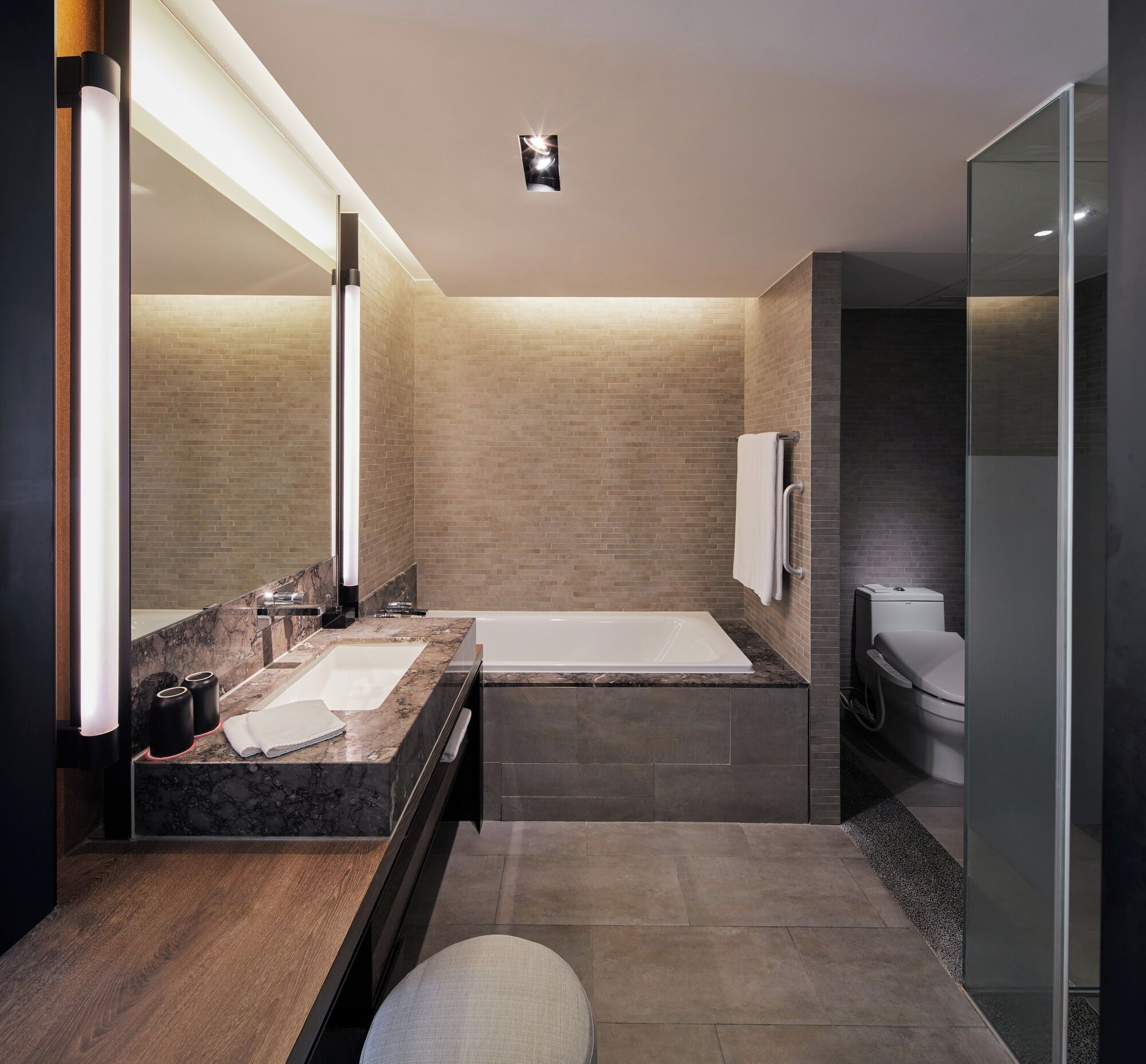 separate bathtub and shower, deep-soaking bathtub, hair dryer, bathrobes