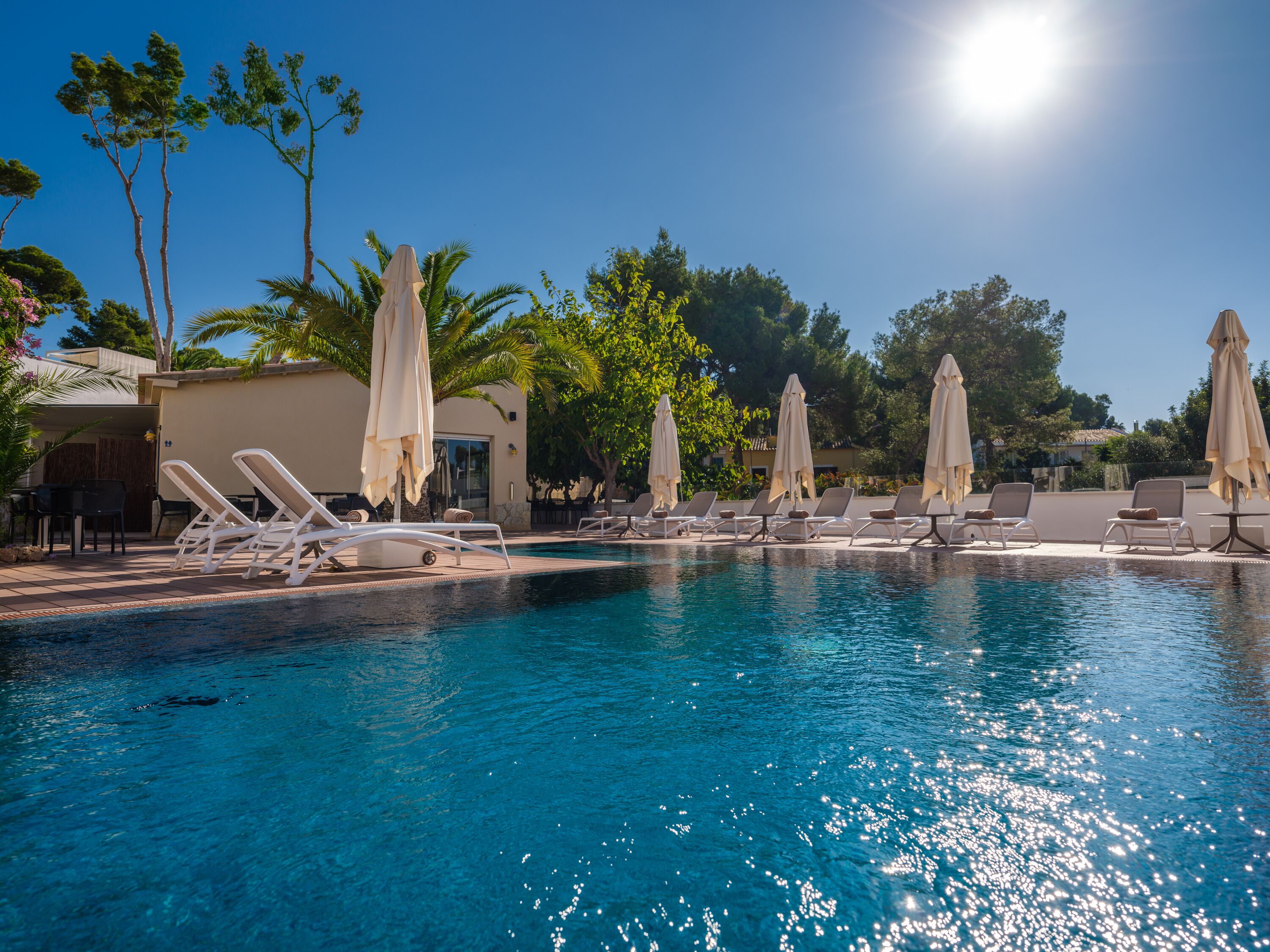 indoor pool, 3 outdoor pools, pool umbrellas, pool loungers