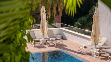 2 outdoor pools, pool umbrellas, sun loungers