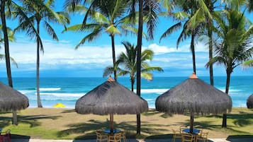Outdoor pool, open 7 AM to 10 PM, pool umbrellas, sun loungers