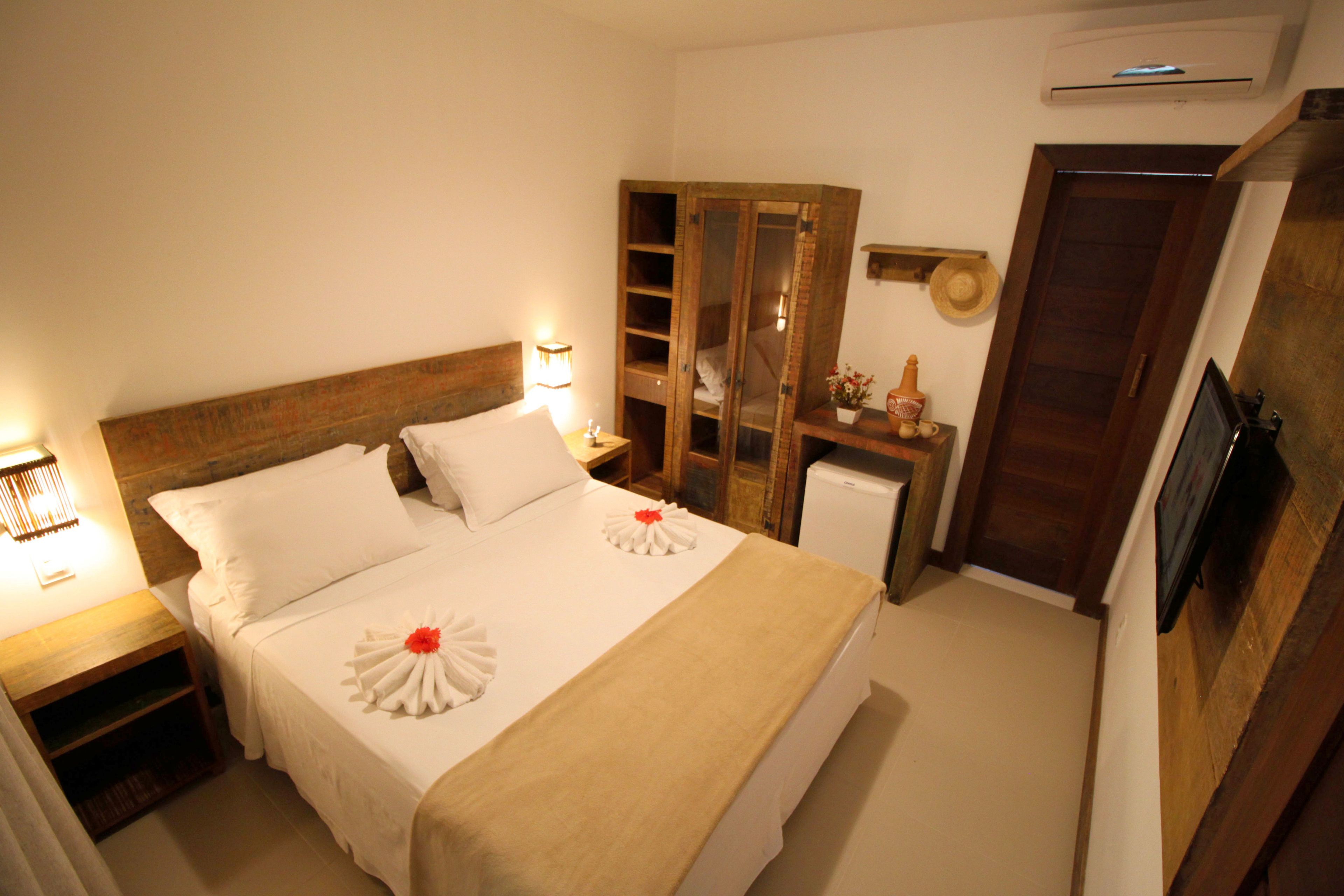 Quarto standard, 1 cama de casal ou 2 camas de solteiro | Frigobar, Wi-Fi de cortesia, roupa de cama