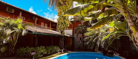 Outdoor pool, pool umbrellas, pool loungers