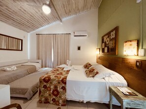 Family Room | Minibar, blackout curtains, bed sheets - Hotel Pousada Tatuapara (Mata de São João)