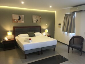 Comfort Studio Suite, Balcony, City View | In-room safe, desk, laptop workspace, iron/ironing board