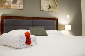 Comfort Studio Suite, Balcony, City View | In-room safe, desk, laptop workspace, iron/ironing board - Curacao Suites Hotel (Willemstad)