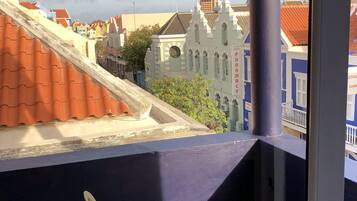 Suíte estúdio conforto, sacada, vista para a cidade | Sacada