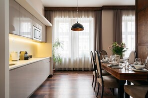 Executive Apartment, Balcony | Private kitchenette | Fridge, coffee/tea maker, electric kettle, paper towels - Topolowa Residence by StayLab (Kraków)