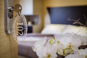 Premium bedding, down duvets, memory-foam beds, desk