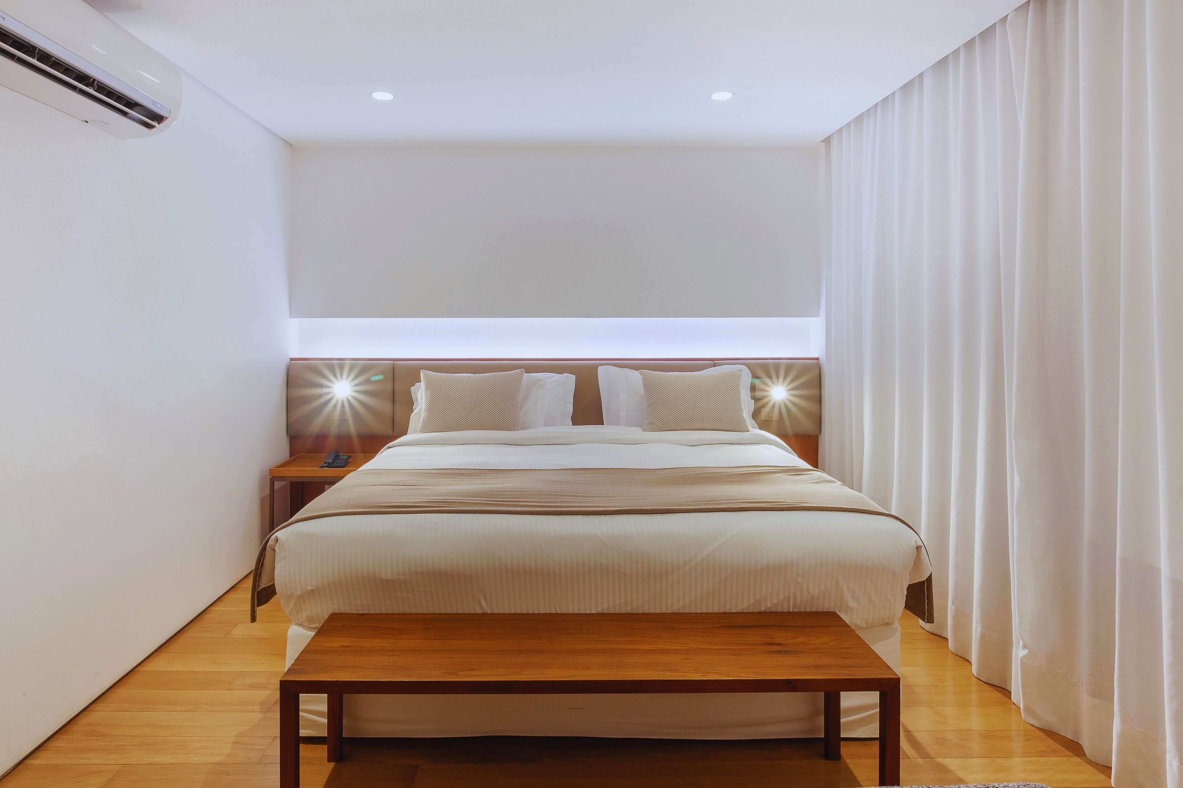 Suíte Royal King | Frigobar, cofres nos quartos, escrivaninha, quartos à prova de som